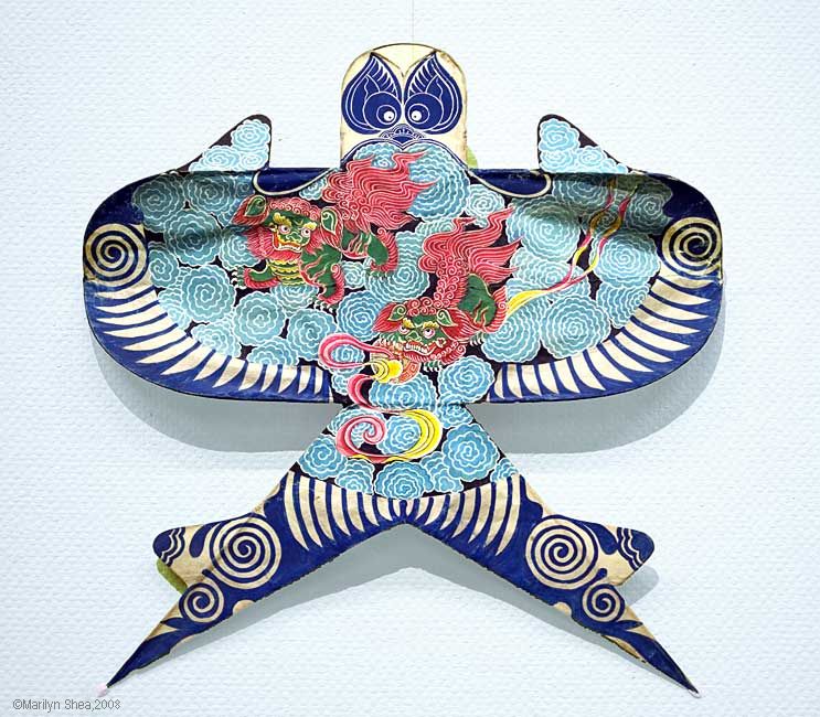 A Lion Rolls the Embroidered Ball Kite