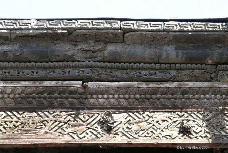 Greek key design finishes the top edge of the roof