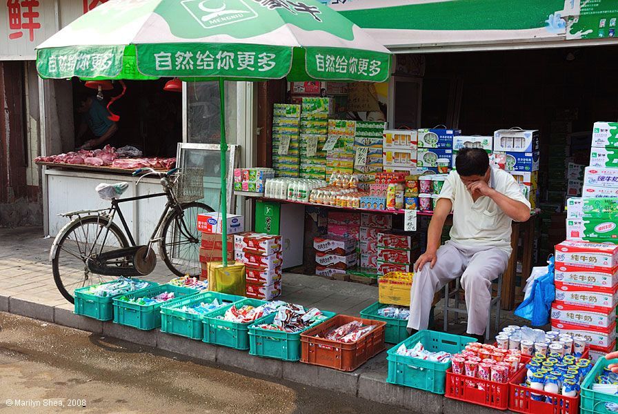 Milk stand with boxes of milk