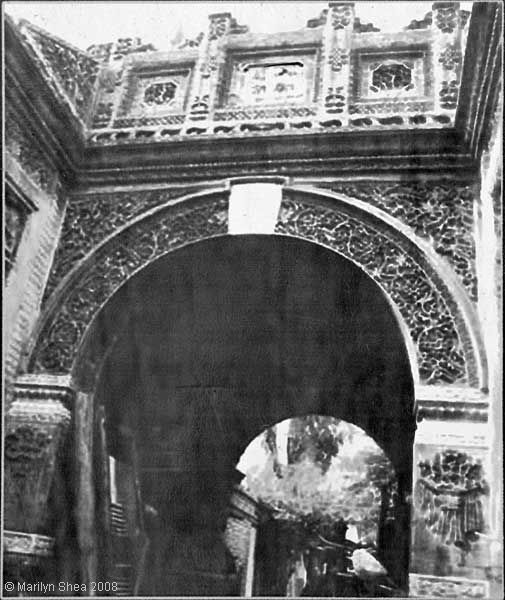 Classic gate entrance with stone carving