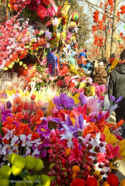 Silk flowers in a booth at Spring Festival Fair