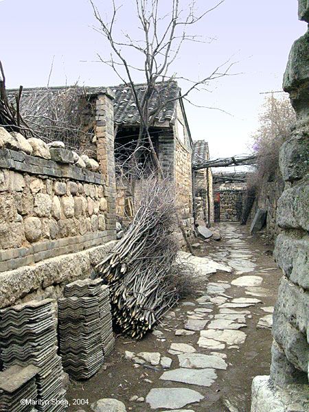 alley through stone walls