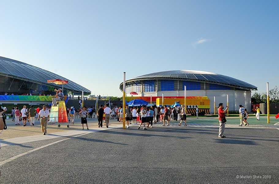 large paved area surrounding the gymnasium