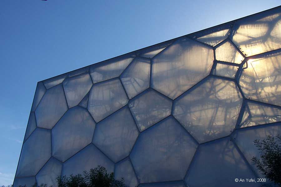 water cube with sun shining through