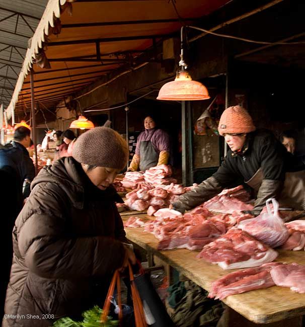 Meat Vendor at the market