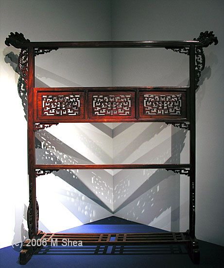 Clothes rack with phoenix design