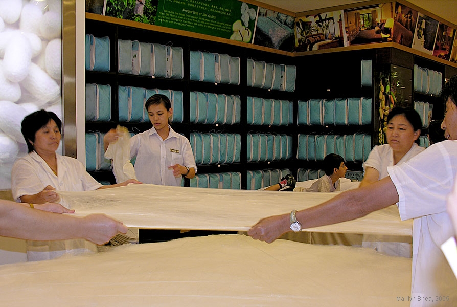 Stretching silk cocoons to make batting