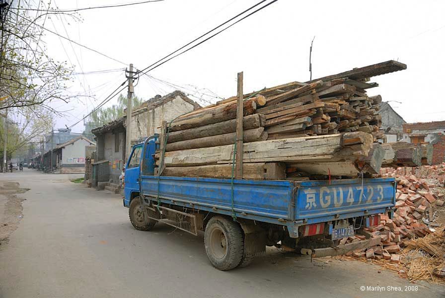 truck holding recycled lumber
