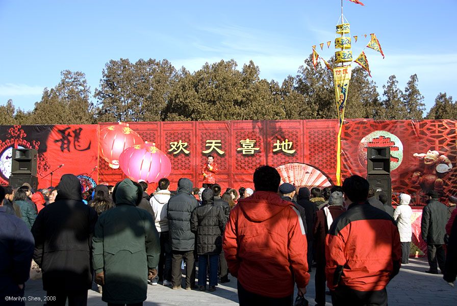 Entertainer dressed in traditional Chinese red