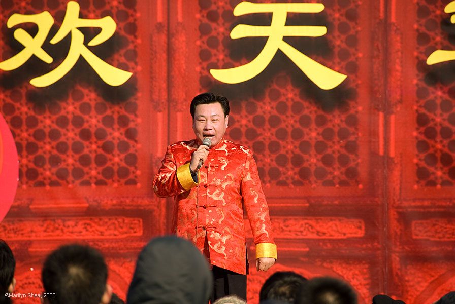 Entertainer dressed in traditional Chinese red