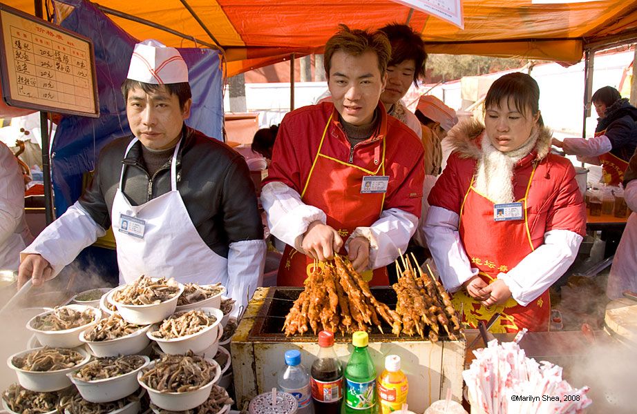 Barbequed skewers of meat with lots of spice