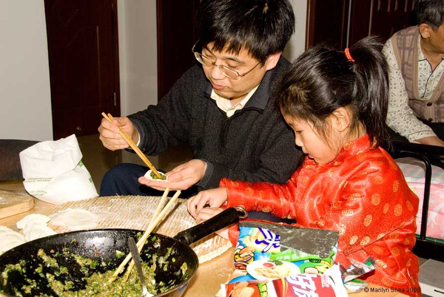 Filling the jiaozi wrappers