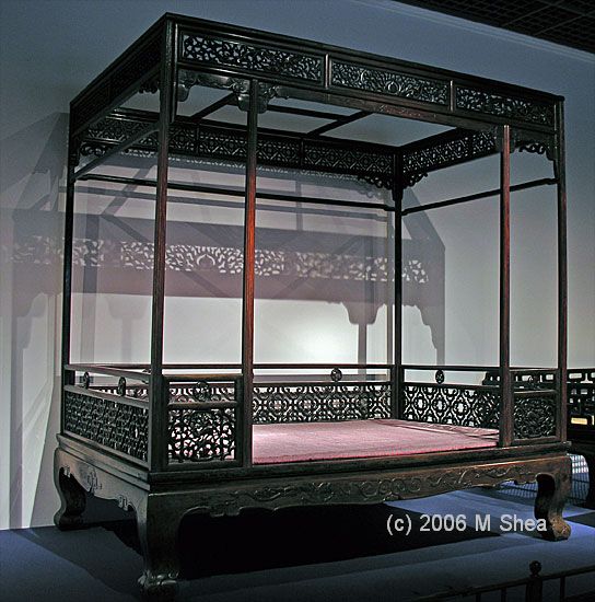 Six post canopy bed with railings