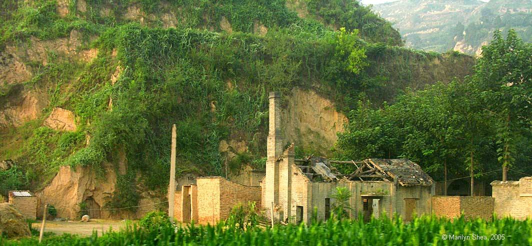 brick building with caved in roof